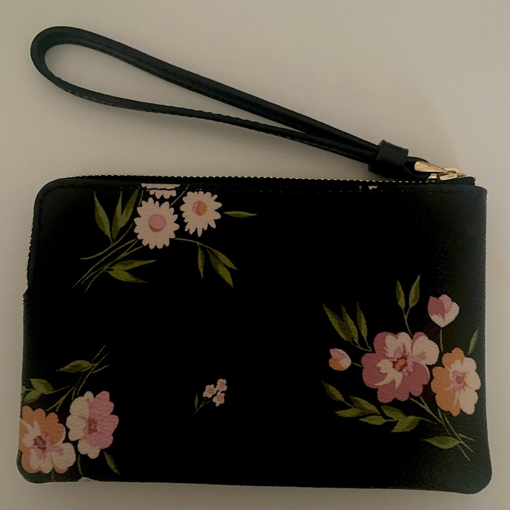 Coach floral Wristlet never used new condition.